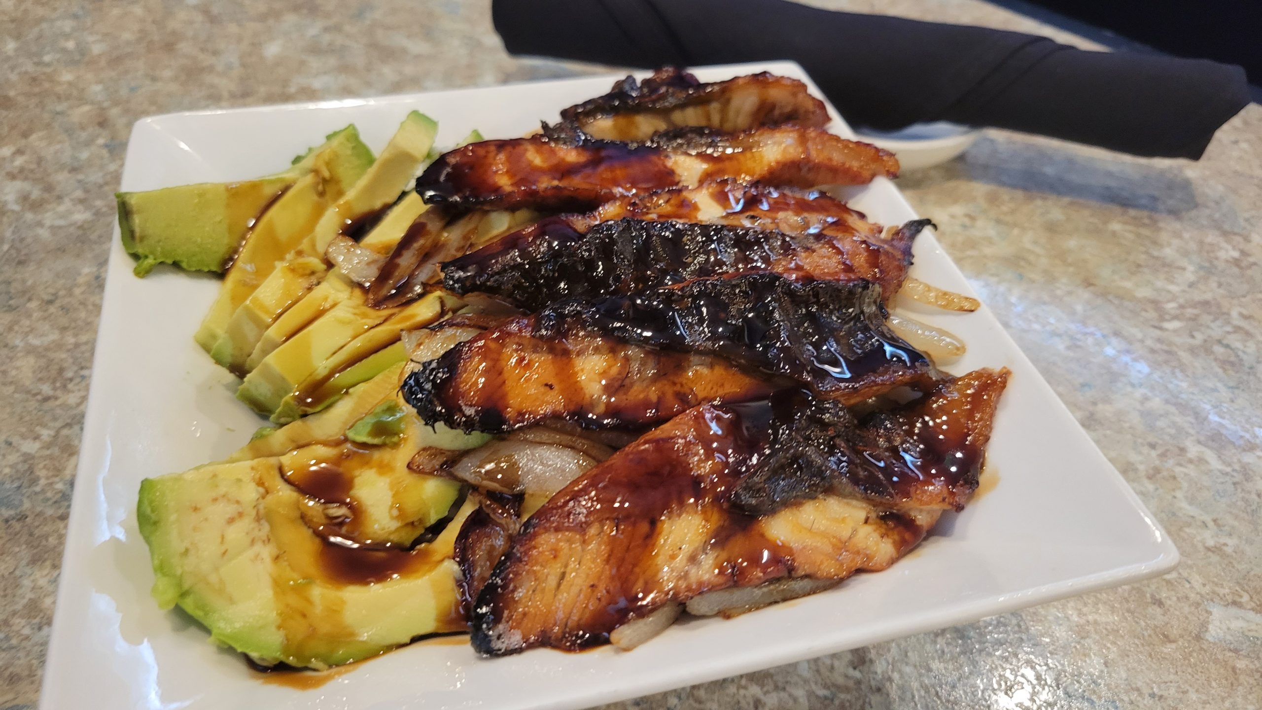 Freshwater Eel And Avocado Bowl Go Fish Sushi Bar - Thousand Oaks, CA Sliced freshwater eel, avocado, and grilled onions drizzled with our very own teriyaki sauce.
All bowls served over a bed of steamed white rice, fried rice can be substituted for an additional $2.00
