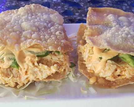 2 pieces of a spicy crab mix, with avocado inside a crispy wonton shell, topped with a spicy mayo sauce and a sliced jalapeno