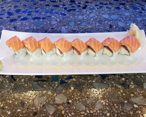 Ed Ed & Eddy Roll Go Fish Sushi Bar - Thousand Oaks, CA Inside: tuna and crab
Outside: salmon drizzled with a spicy mayo and chilly oil