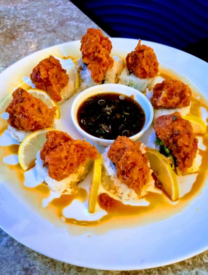 Inside: albacore, cucumber, avocado
Outside: spicy tuna, ponzu sauce, green onion