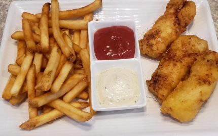 Beer battered North Atlantic Cod with french fries and tarter sauce.