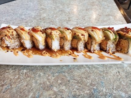 Inside: spicy tuna, spicy crab, shrimp tempura
Outside: seared white tuna, ichi sauce, spicy mayo, siracha, chili flakes