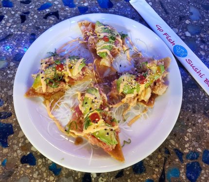 A spicy fish blend on top of crispy wonton chips