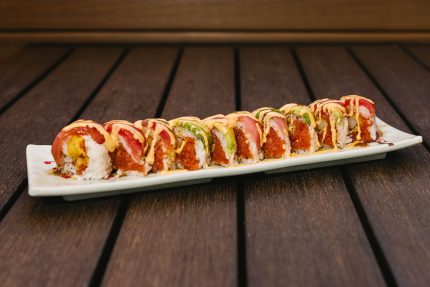 Inside: shrimp tempura, spicy tuna and cucumber
Outside: fresh tuna and avocado drizzled with spicy sauce