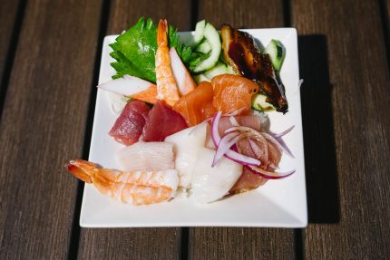 This bright, fresh dish includes assorted sashimi, Oba leaf, and cucumber, all on top of a fluffy bed of sushi rice.