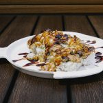 Inside: crab, cucumber and avocado Outside: baked lobster with cream & sweet sauce