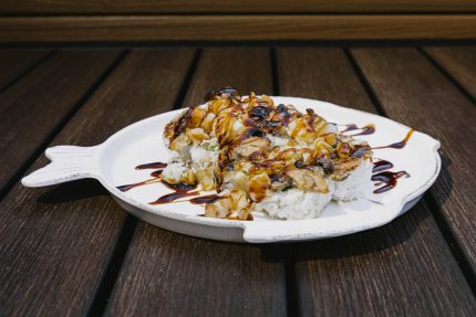 Inside: crab, cucumber and avocado Outside: baked lobster with cream & sweet sauce