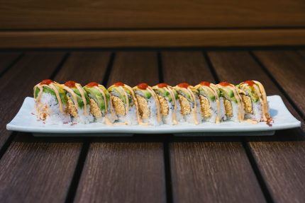 Inside: spicy shrimp and spicy crab Outside: avocado drizzled with spicy sauce